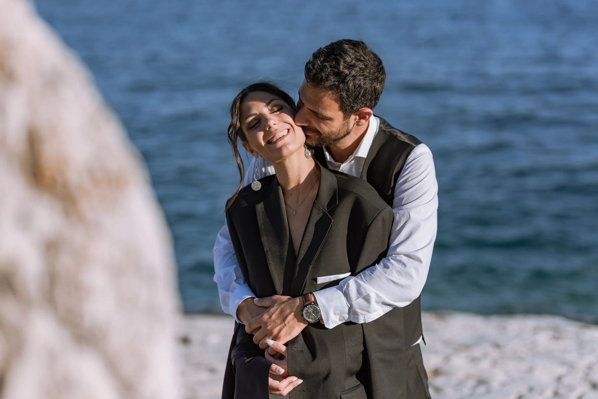 Hara and Giannis on their wedding day at Psiliammos beach in Thassos — photographed by MOA